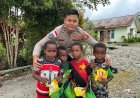 Momen Harmonis Personel Satgas Ops Damai Cartenz Bersama Masyarakat dan Anak-Anak di Mimika